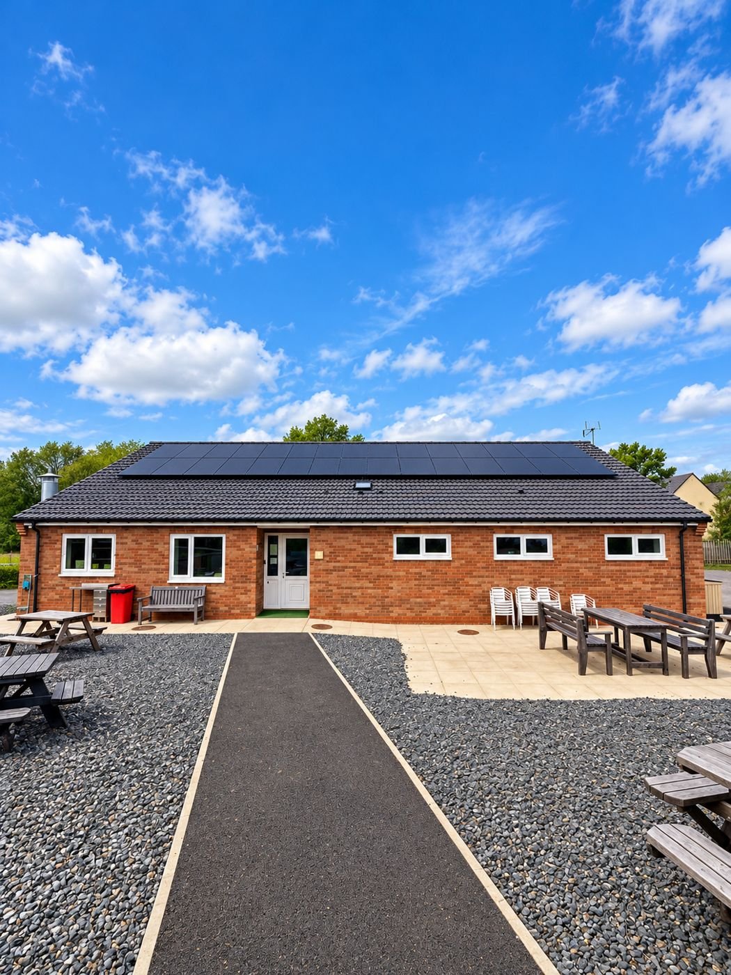 Solar panels across a brick bungalow roof